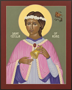 The icon of Saint Cecelia by Nicholas Markell portrays Cecilia, the patron saint of musicians and poets ringing a bell with a bird singing over her shoulder. The icons beautiful interplay of color and simple composition create a striking portrait of Saint Cecelia.