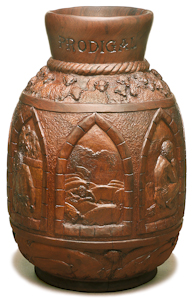 The hand carved mahogany vase Prodigal Son, by Charles Smalligan is part of The Larry & Mary Gerbens Collection of Art inspired by the parable of the Prodigal Son. The Charles Smalligan hand carved mahogany vase Prodigal Son, is featured in the book The Father & His Two Sons - The Art of Forgiveness